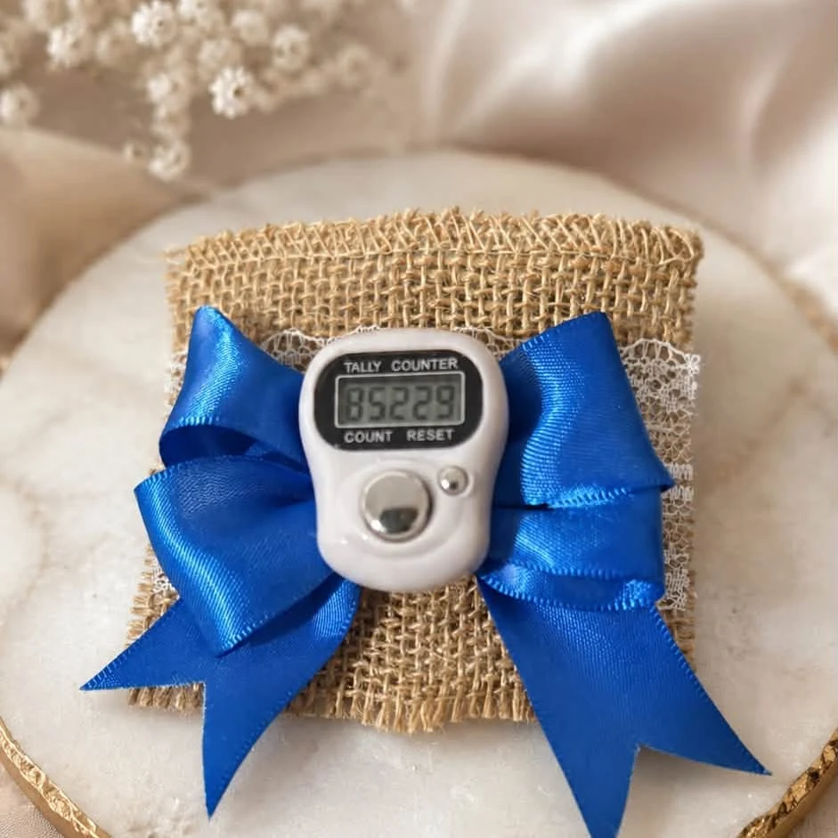 Royal blue satin favor with a neat handcrafted bow